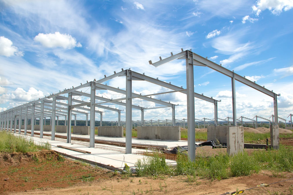 Metal construction on a concrete base.